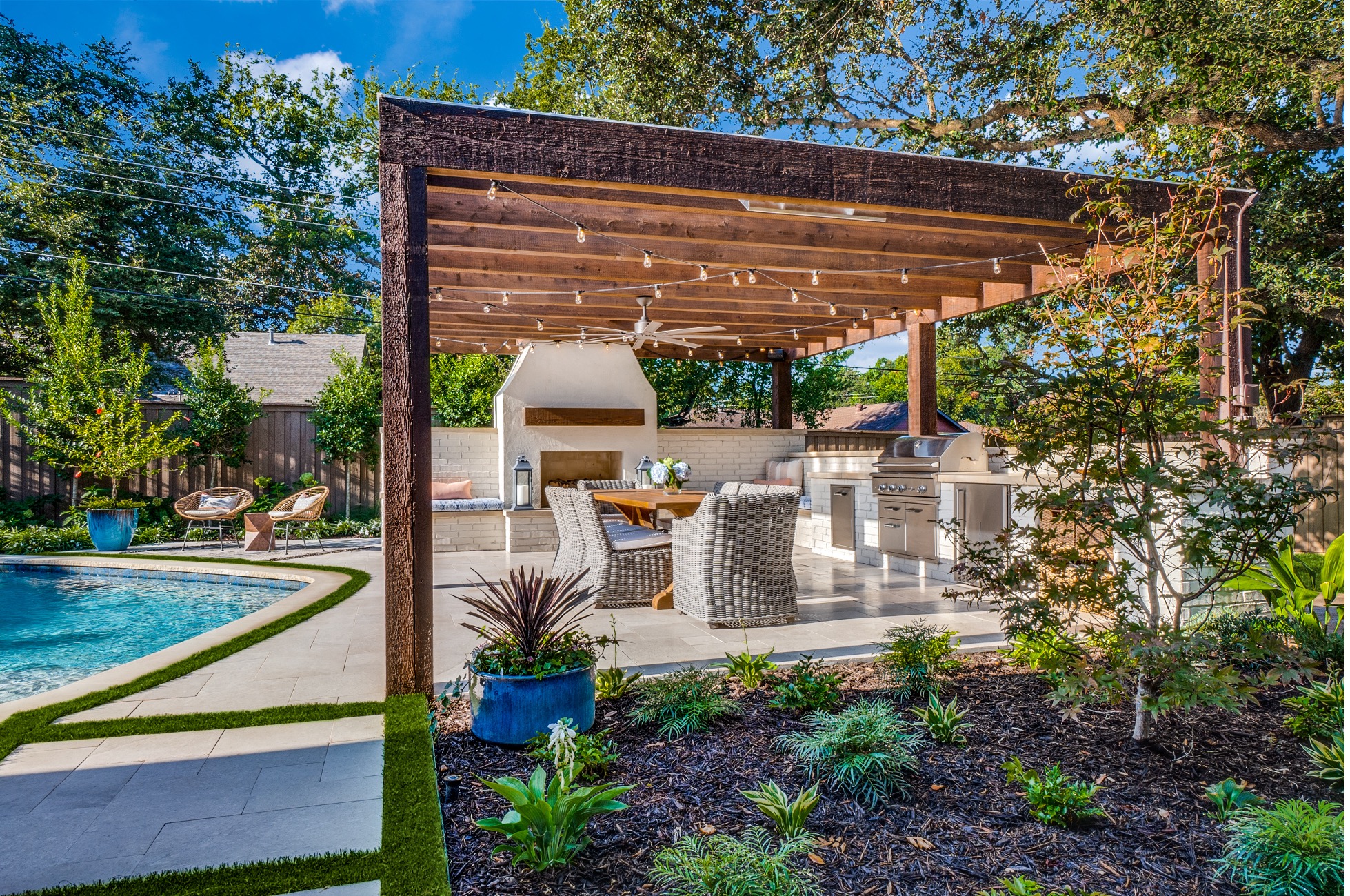 Custom patio with overhead shade pergola